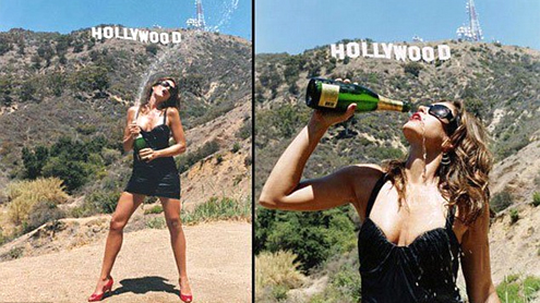 Cindy Crawford Welcomes New Year 2013 Under Hollywood Sign And Pops Champagne